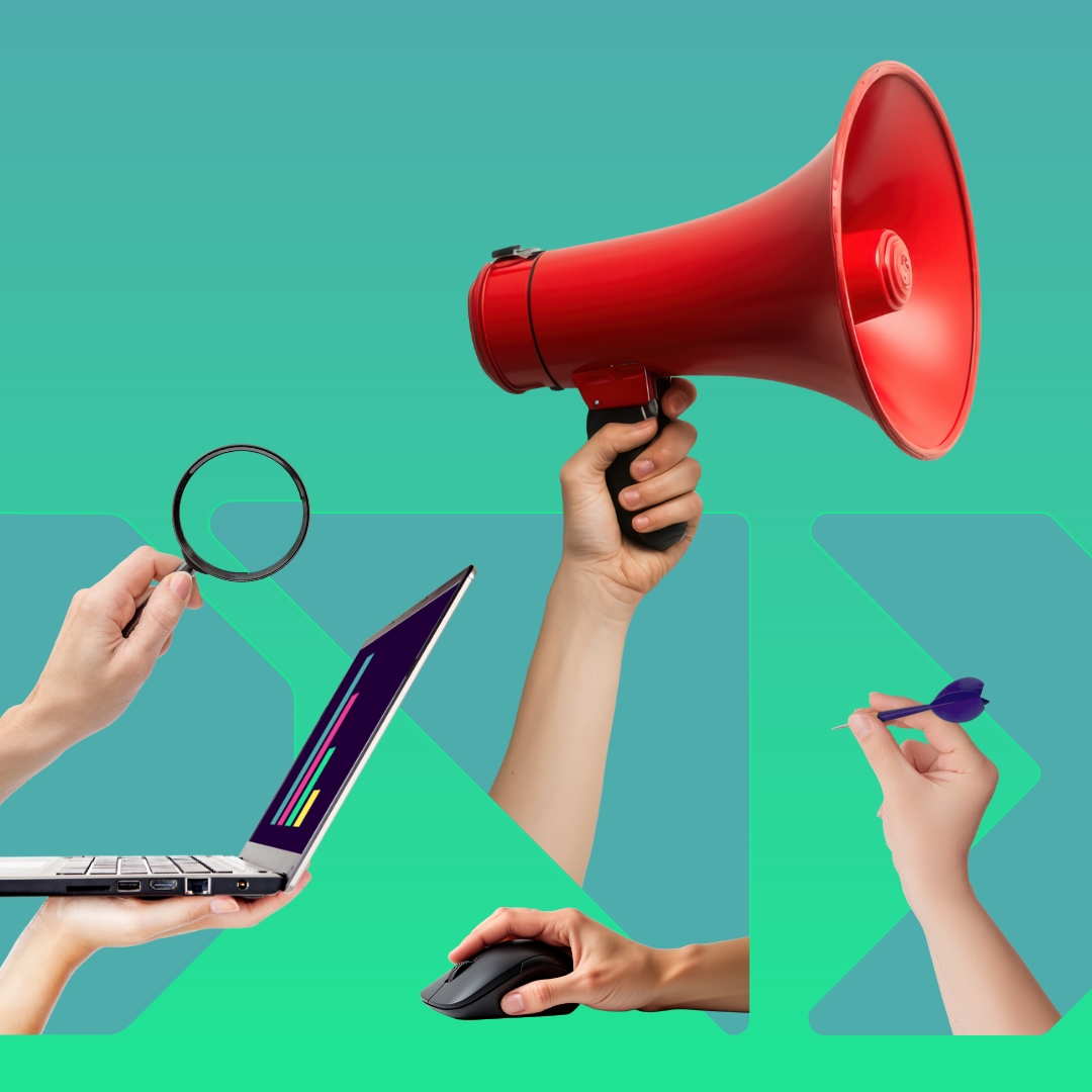 Several hand cuts out holding different objects such as a red megaphone, laptop, mouse, dart and magnifying glass.
